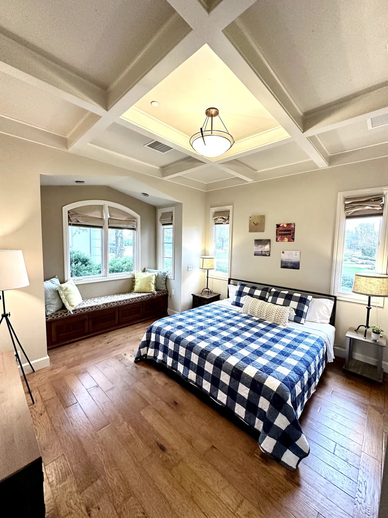 The Courtyard Room with a coffered ceiling and window seat