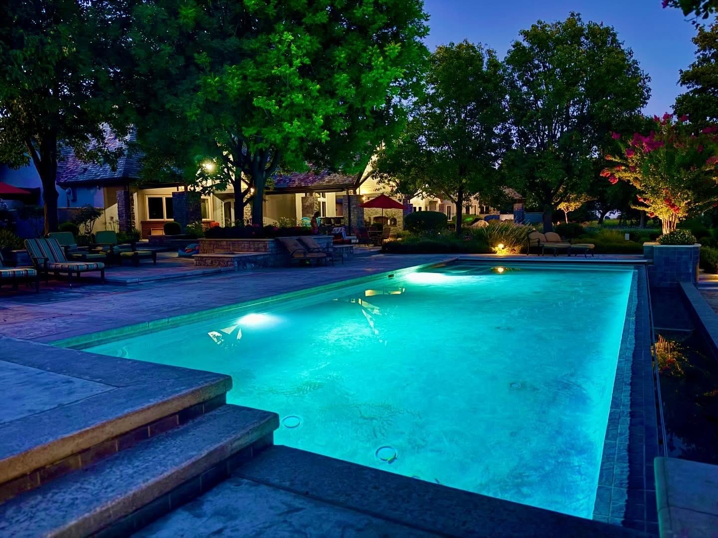 The pool lit after dark